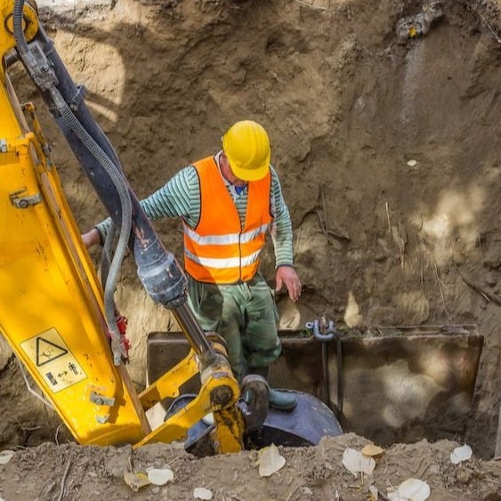 construction-worker-in-excavation-pit-Square